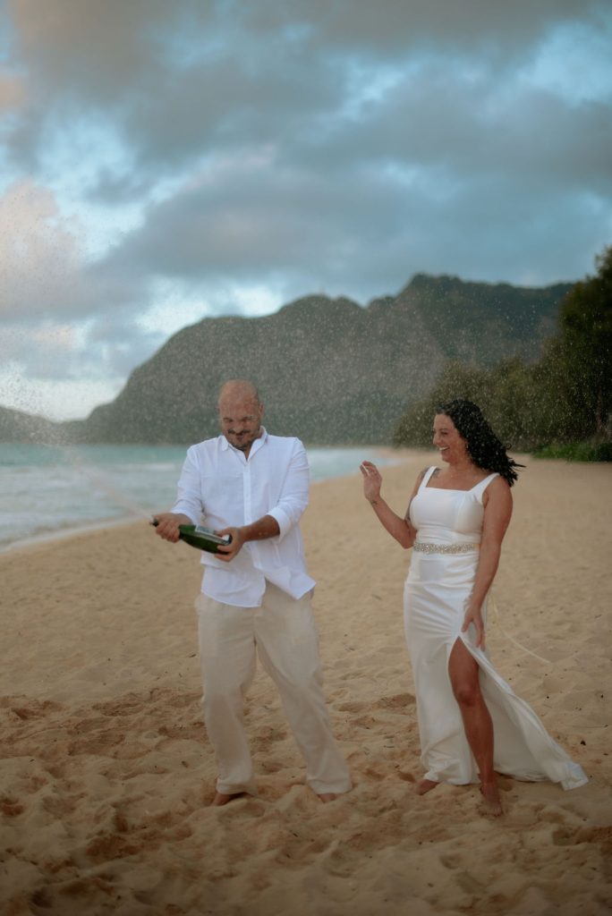 Couple celebrating on beach
