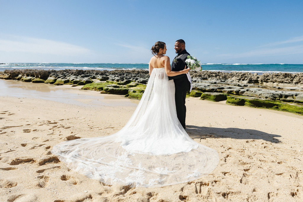 Active-duty military couple kissing during an express civil marriage ceremony on Oahu performed by Rev James Chun.